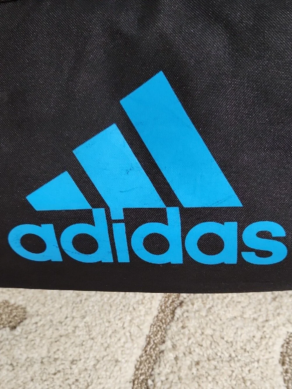 Adidas Black Duffel Bag with Bright Blue Accents